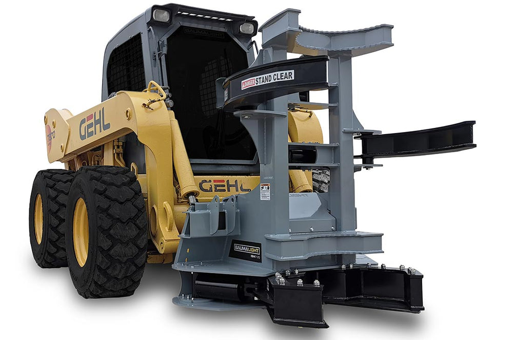 A skid steer with a Baumalight tree shear attached to it, designed for cutting down trees.
